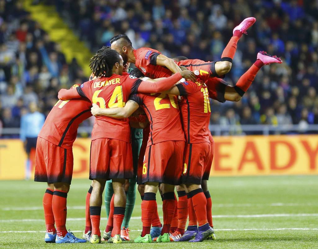 Galatasaray's players celebrate goal scored by Kisa during their Champions League group C soccer match against Astana at Astana Arena stadium in Astana
