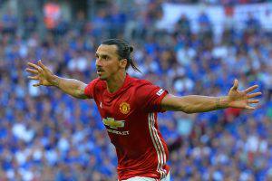 Manchester United's Swedish striker Zlatan Ibrahimovic celebrates scoring their second goal during the FA Community Shield football match between Manchester United and Leicester City at Wembley Stadium in London on August 7, 2016. / AFP PHOTO / GLYN KIRK / NOT FOR MARKETING OR ADVERTISING USE / RESTRICTED TO EDITORIAL USE