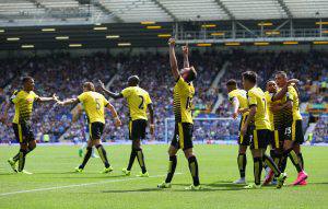 LIVERPOOL, ENGLAND - AUGUST 08: Miguel Layun (C) of Watford celebrates scoring his team's first goal with his team mates during the Barclays Premier League match between Everton and Watford at Goodison Park on August 8, 2015 in Liverpool, England. (Photo by Jan Kruger/Getty Images)