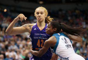 Jun 27, 2015; Minneapolis, MN, USA; Minnesota Lynx forward Devereaux Peters (14) plays defense on Phoenix Mercury center Brittney Griner (42) in the second quarter at Target Center. Mandatory Credit: Brad Rempel-USA TODAY Sports
